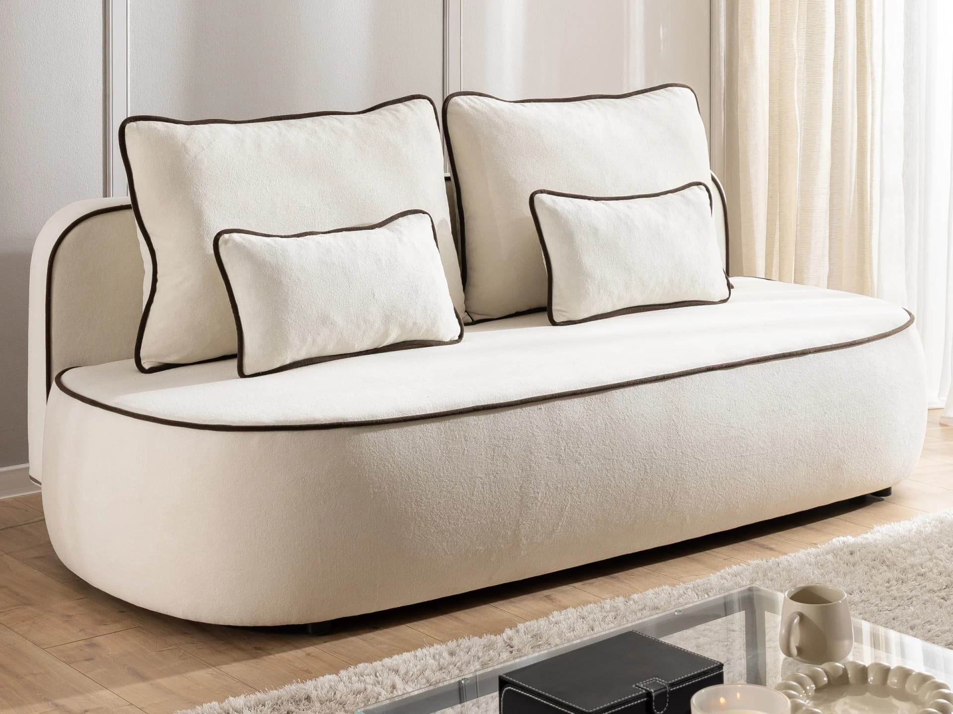 Vero – Modernes und abgerundetes 3-Sitzer-Schlafsofa mit Bettkasten und Kontrastpaspel aus Plüschstoff